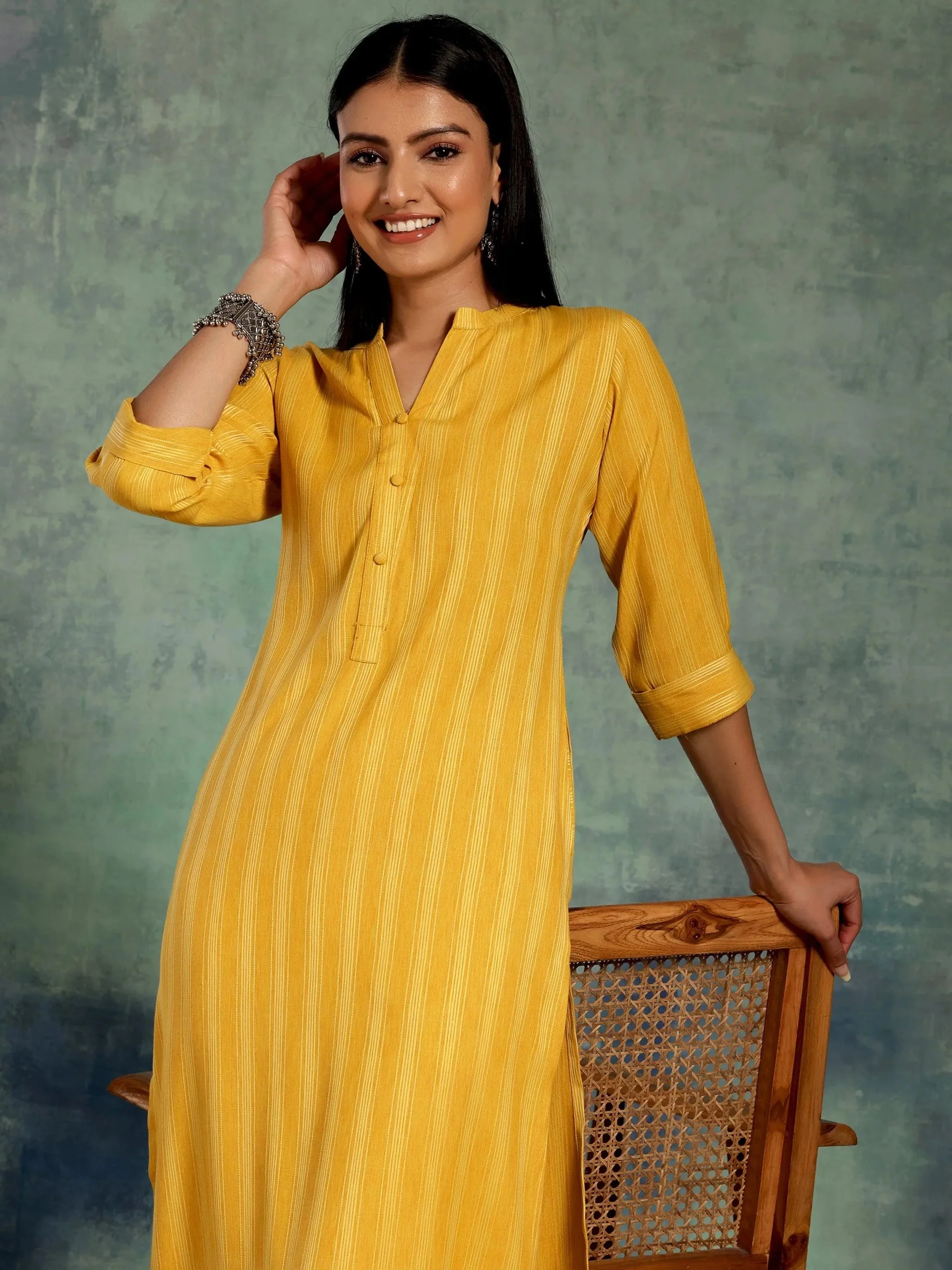 6_4cd9a727-7522-4e84-b73b-17f036d97640.webp Yellow Woven Design Rayon Straight Kurta - Image 1